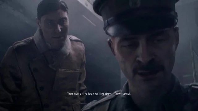 Two soldiers in a story cinematic, subtitled "You have the luck of the devil, Townsend"