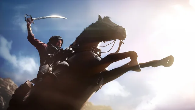 A rider rearing up with a raised sabre, silhouetted against the sky