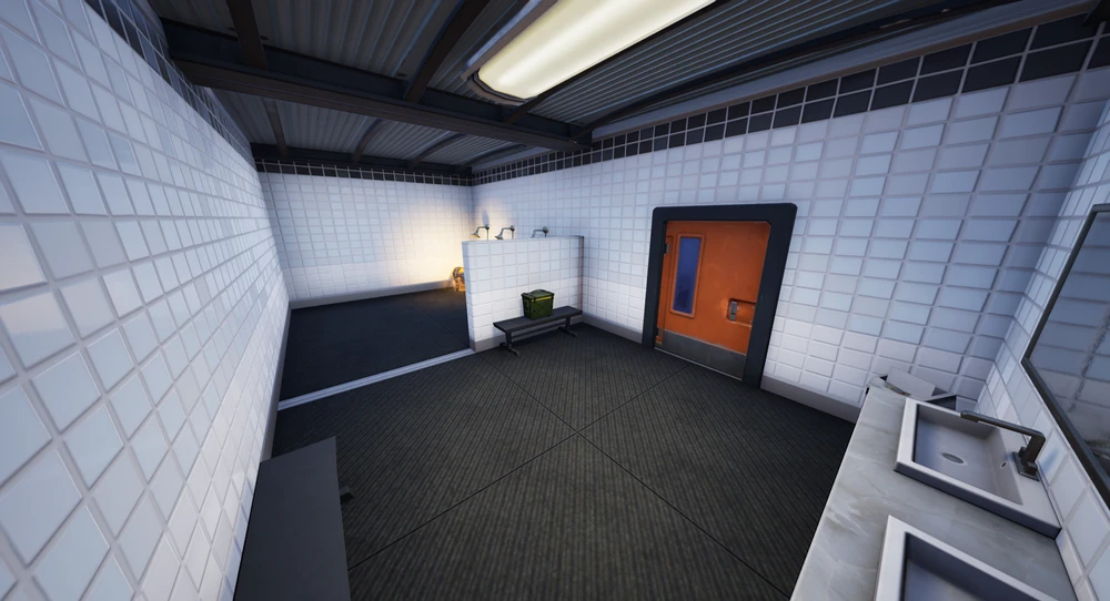 A white tiled bathroom inside the Lakeside Lab with an orange door and a basin